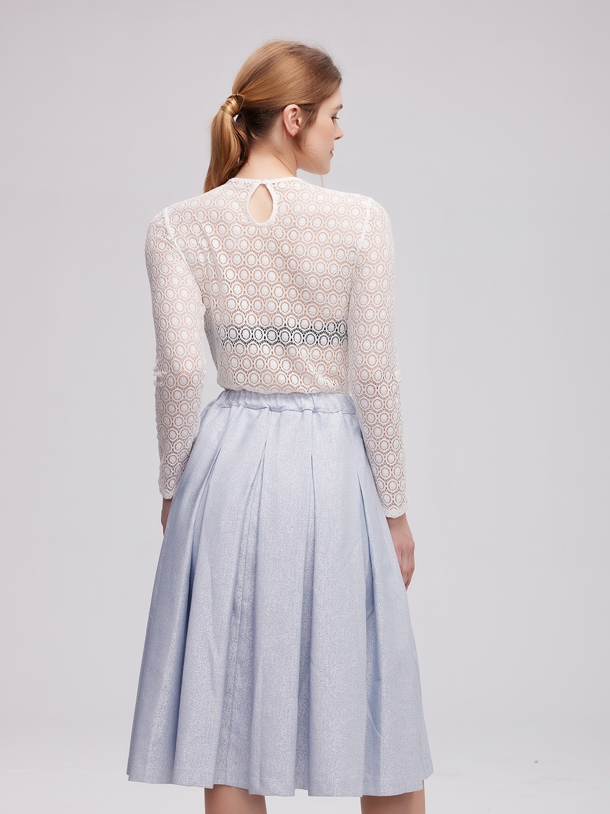 Braune Dirndl mit blauem Rock