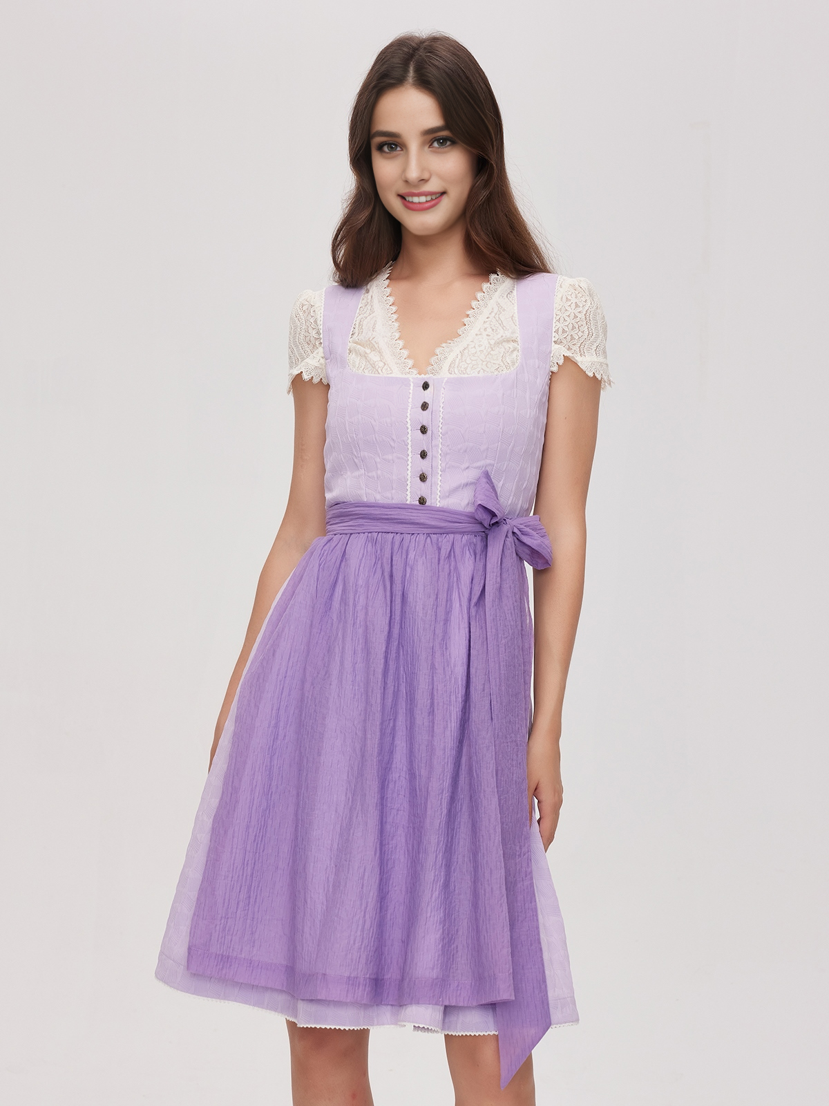 Dirndl in Olivgrün mit lila Schürze